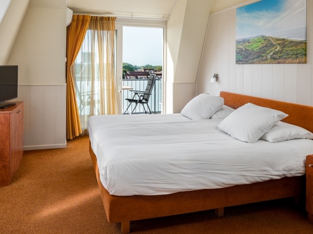 Suite Deluxe zeezicht bed